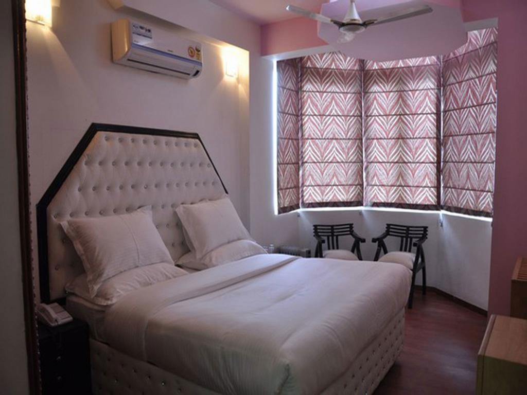 Hotel The Royal Court Nainital Zimmer foto